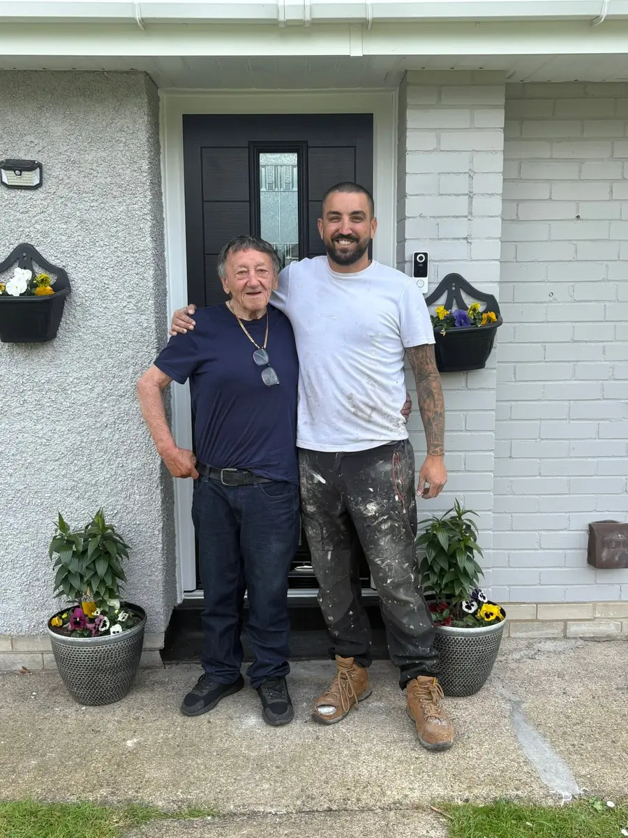 Customers beside their newly fitted composite entrance door