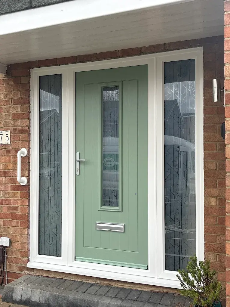 Green composite door with glazed sidelights